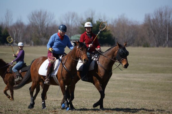 Kristy in action playing Polocrosse!